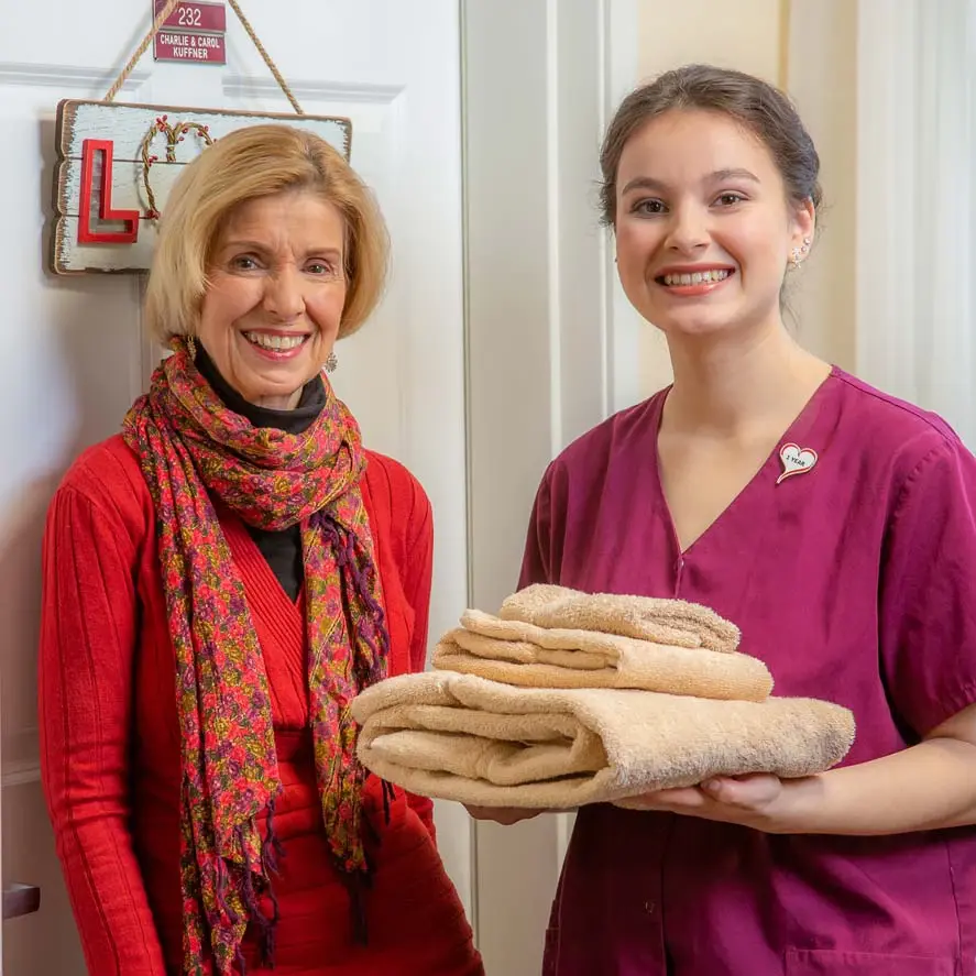 Riverwalk Estates women given towels to women