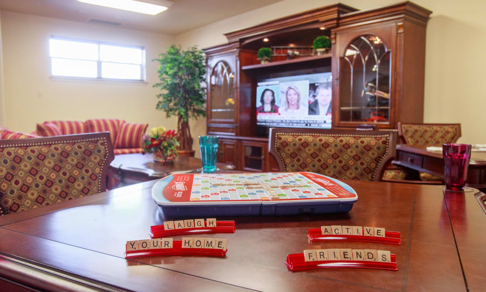 Play games like Scrabble with friends at Riverwalk Estates