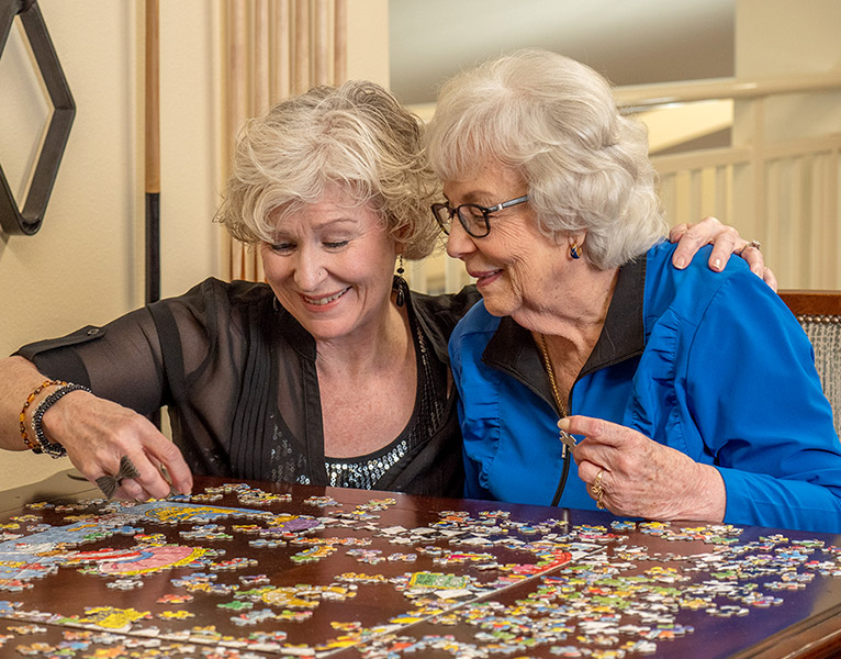 Puzzles with friends at Riverwalk Estates
