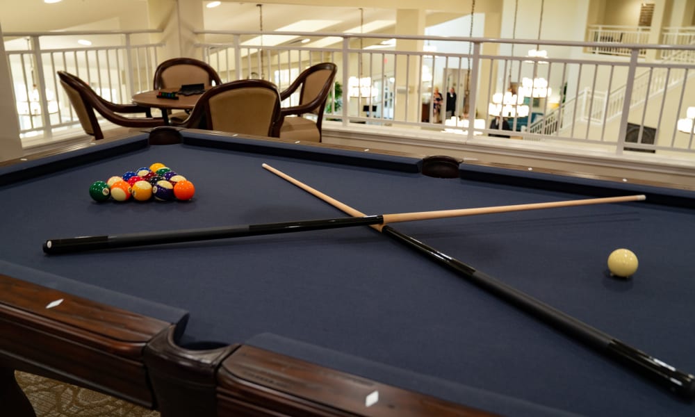 Shoot some pool at Riverwalk Estates
